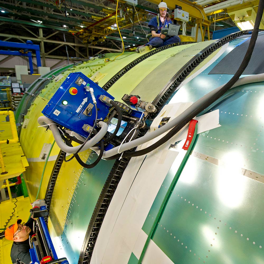A flex track joining fuselage sections in 777 final assembly in May 2012. Boeing incorporated flex tracks into the assembly process for forward and aft fuselage sections in mid-2019.