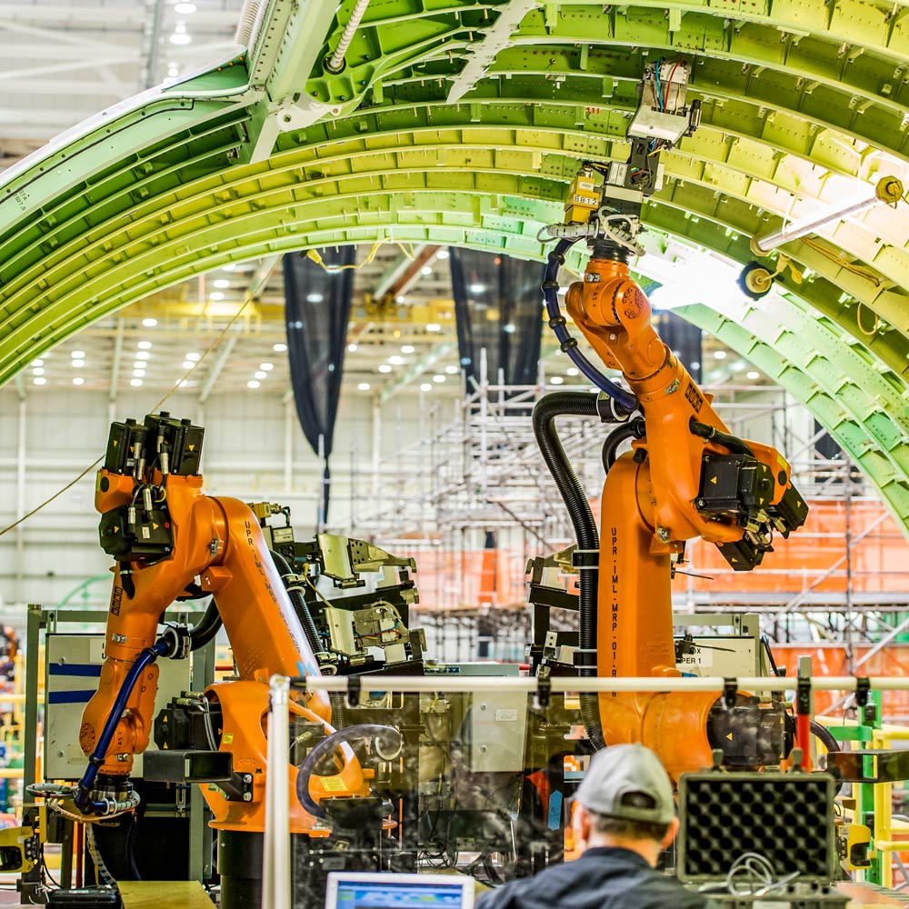 Designed to improve workplace safety and quality, Boeing’s FAUB initiative included determinant assembly as well as autonomous, guided robots that drilled and installed fasteners to form 777 fuselages.
