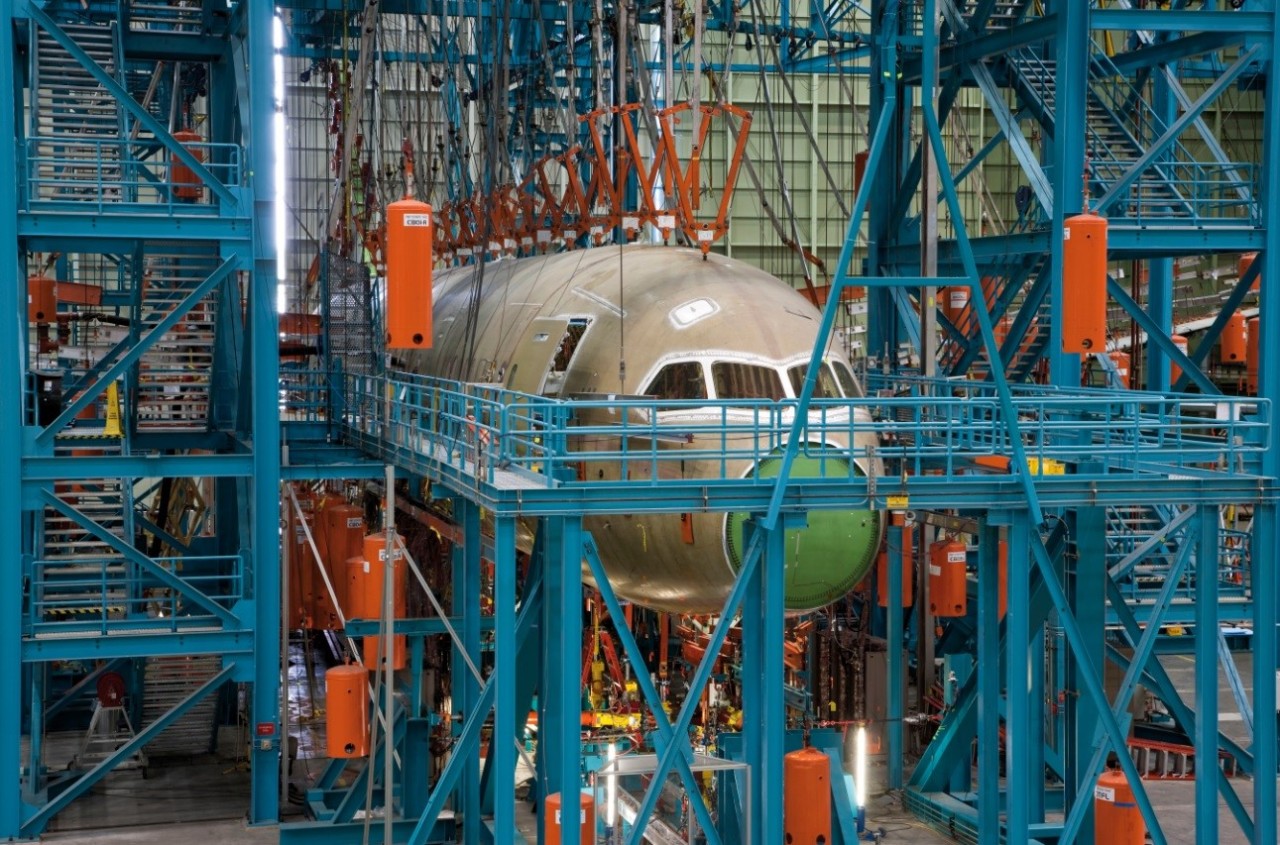The Boeing 787 Dreamliner static test airplane is shown loaded into a sophisticated testing fixture, subjecting the airframe to extreme loads. Engineers analyzed the results to ensure the first 787 was ready for flight test. The data gathered was also used by the Federal Aviation Administration in certifying the airplane.