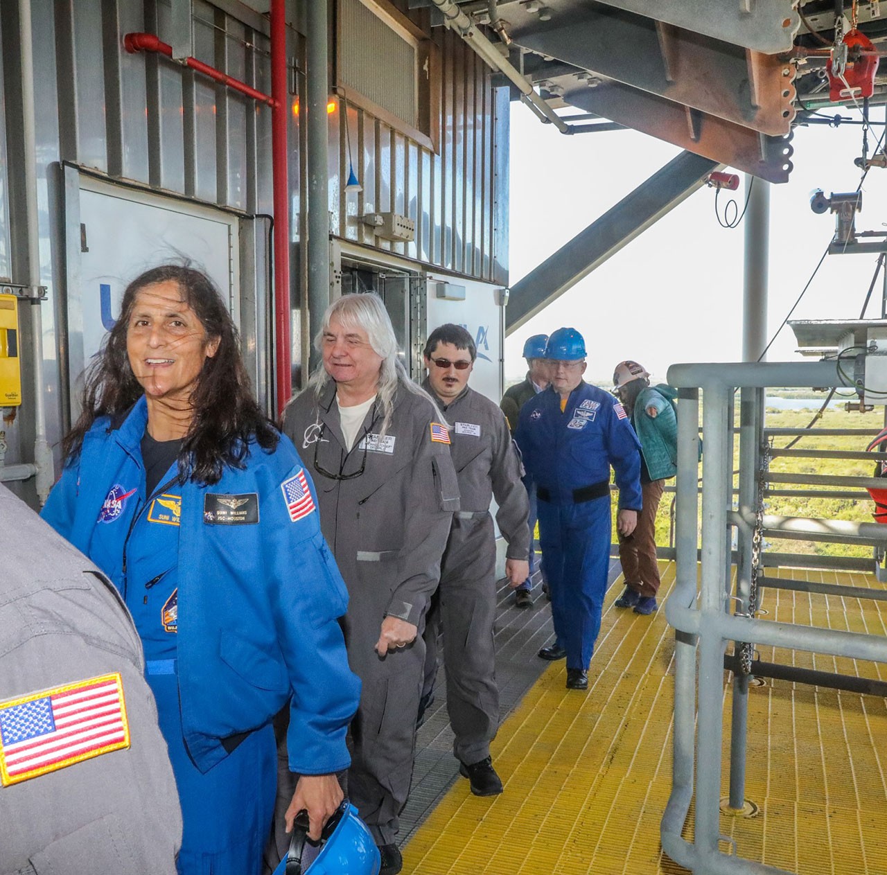 Pad Team members (in gray, from left) Michael Decarlo and Ed Bourne, Jr. with NASA astronauts Suni Williams and Mike Fincke, backup pilot, at Space Launch Complex-41 during an Integrated Crew Exercise.