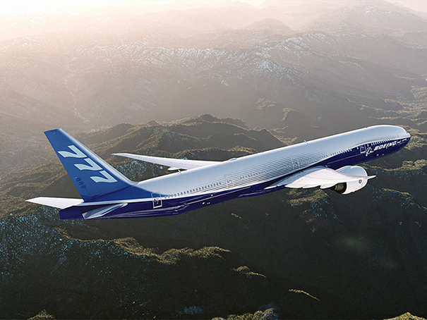 777 in flight over mountains