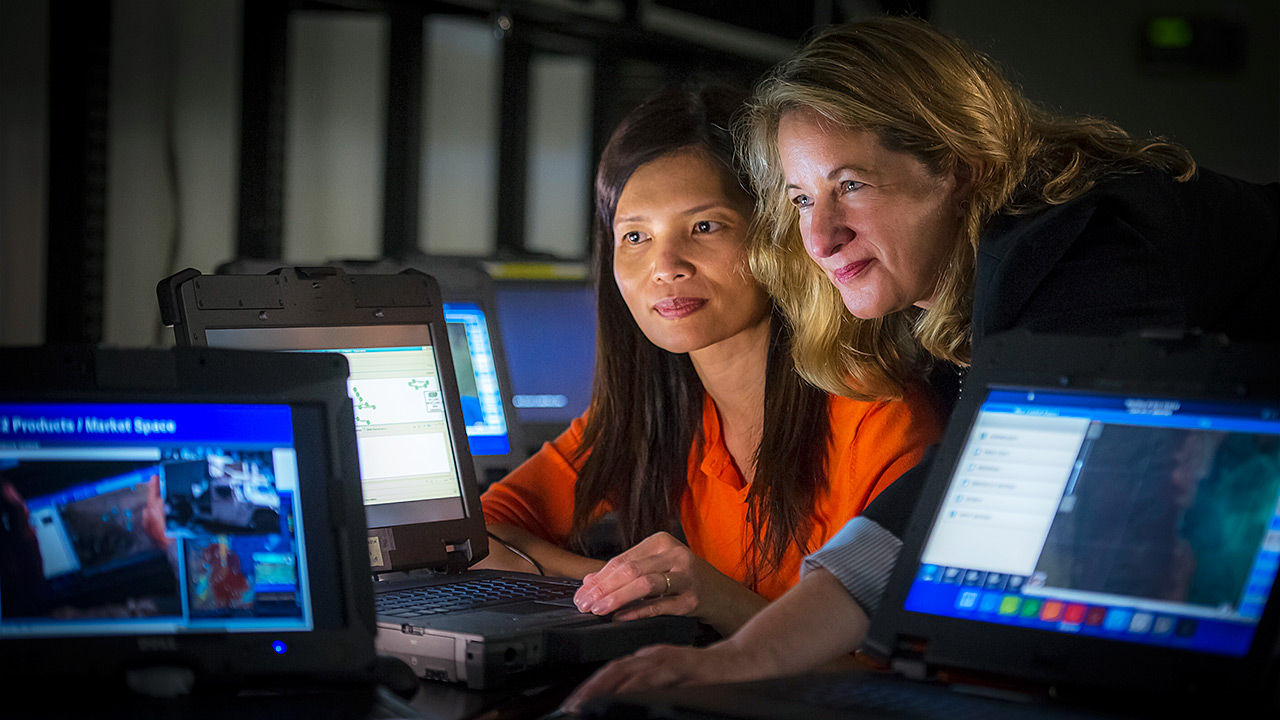2 women at computer