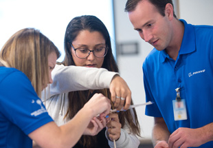 Picture of staff and student.