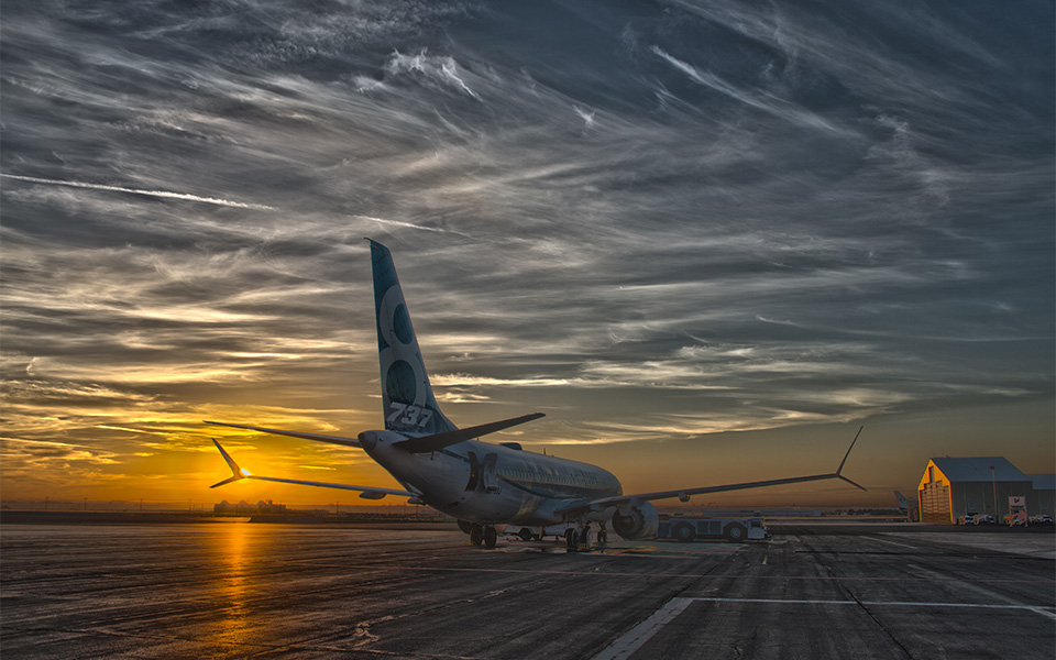 Test airplane 1A003 at sunrise getting ready for a day of flight testing at Moses Lake, Wash.