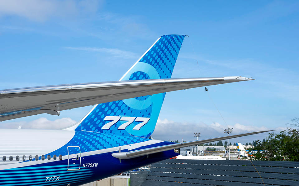 Wing in flight mode and tail of 777X-9