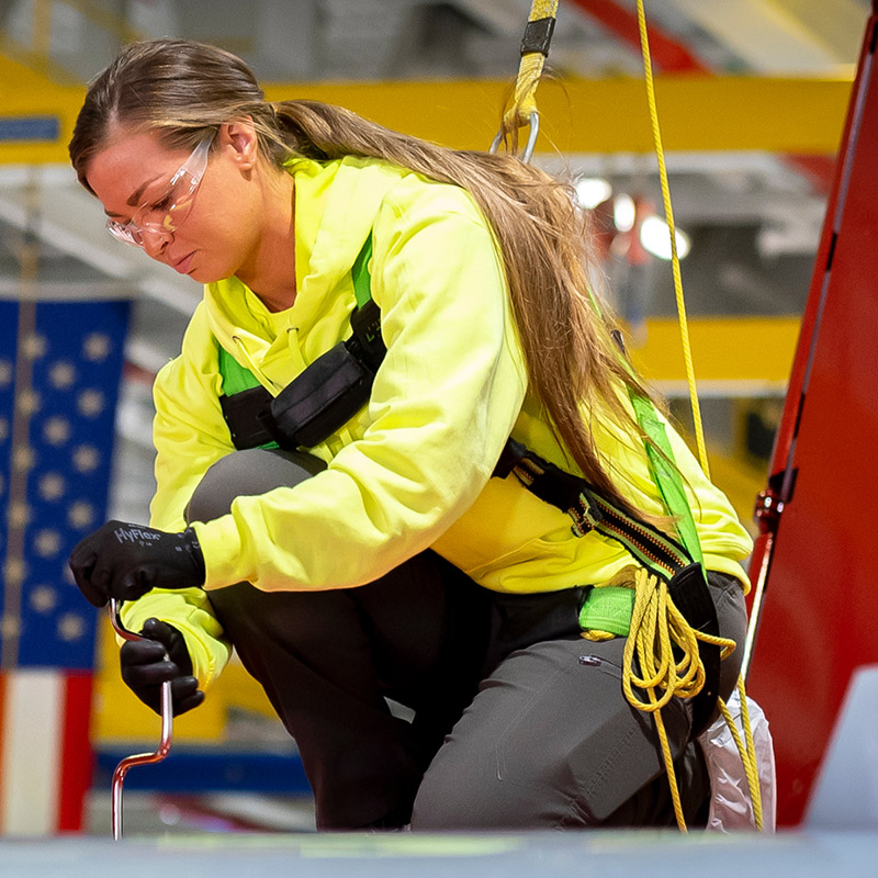 Boeing employee working on aircraft