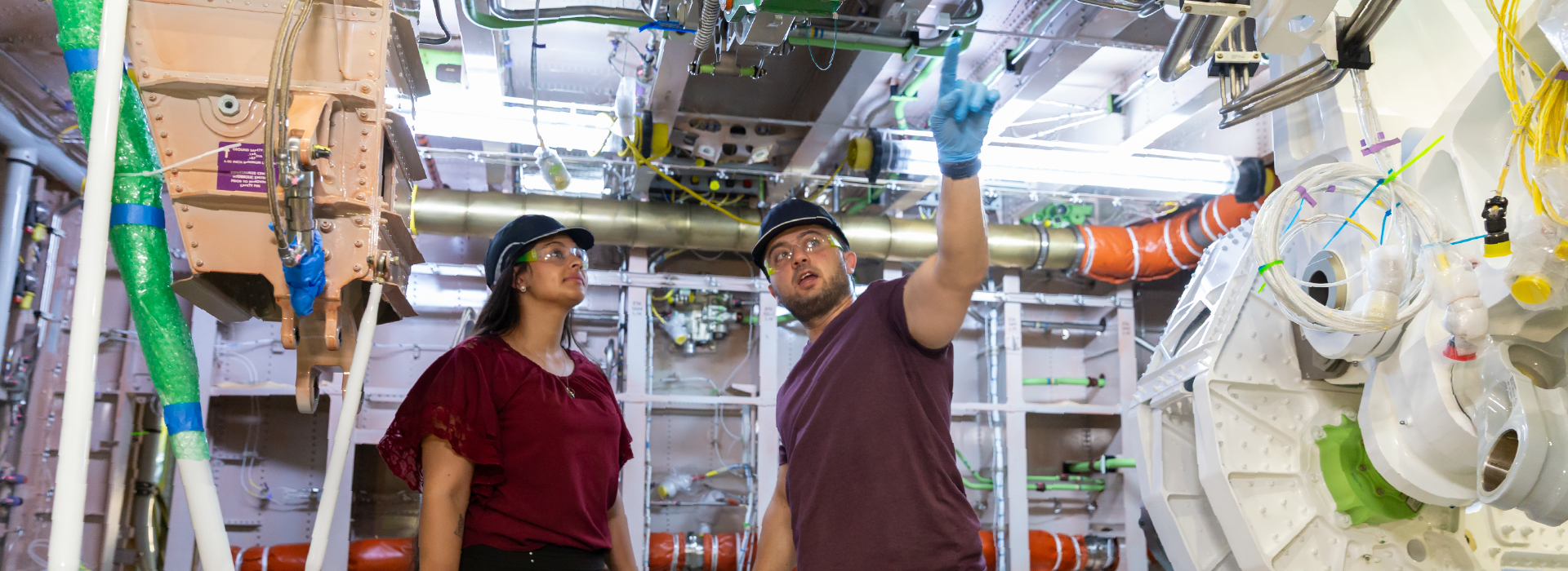 Workers in a bucket lift