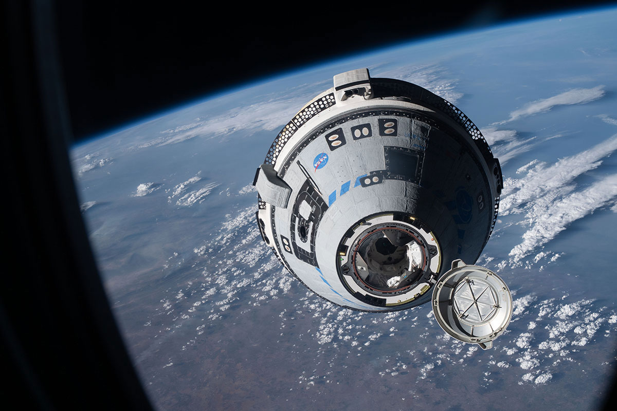 The CST-100 Starliner autonomously approaches the International Space Station during the uncrewed Orbital Flight Test-2 in May 2022.