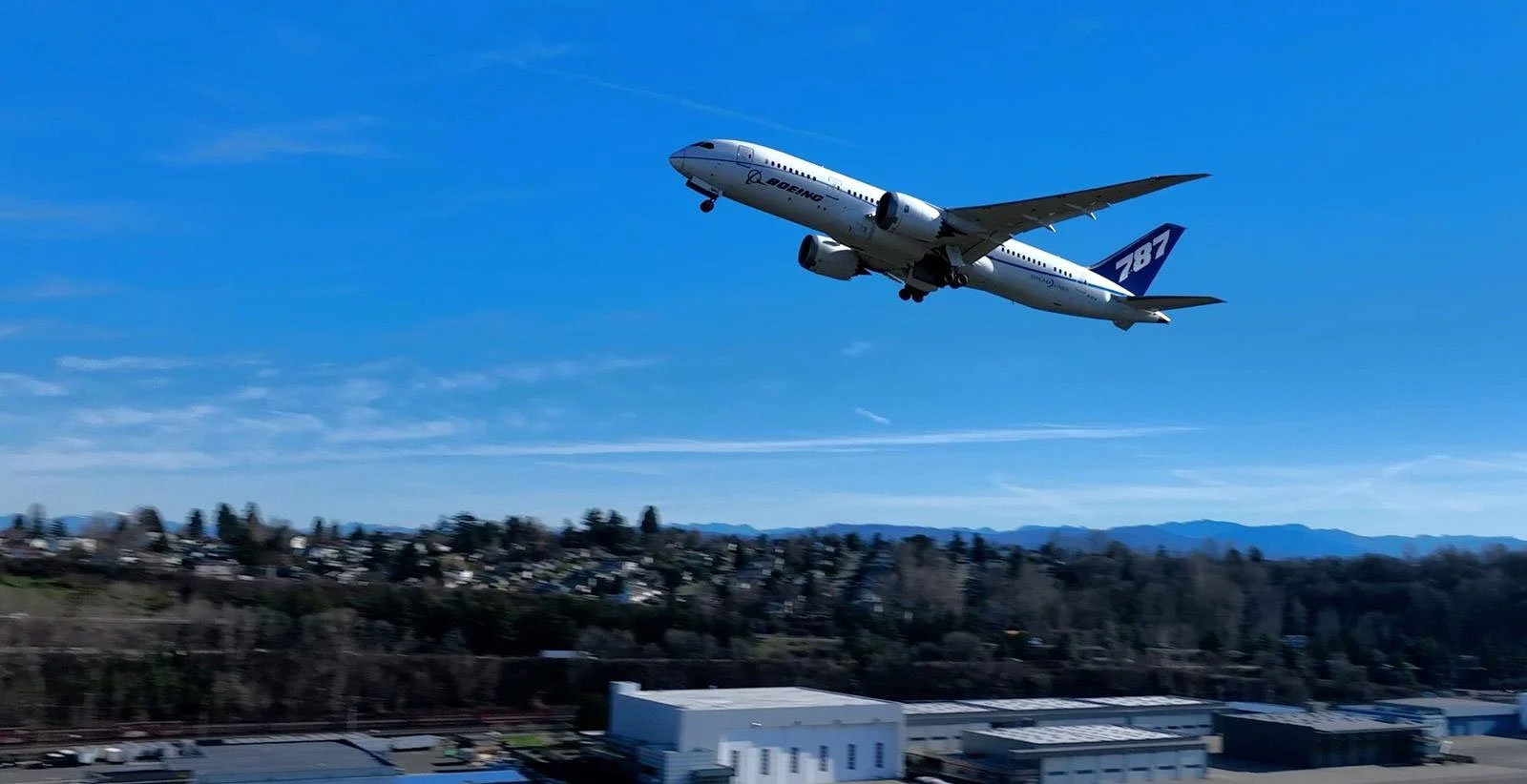 ZA004 takes off for its final flight from Boeing Field in Seattle.