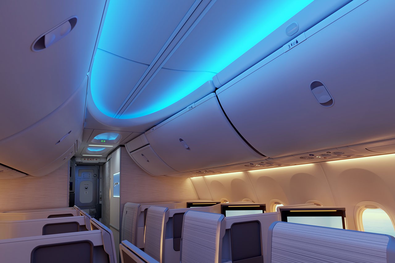 Detail view of the 737 MAX cabin ceiling showing the ambient LED lighting in a premium class setting.