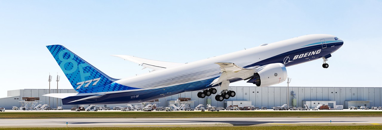 777-8F taking flight on a clear day