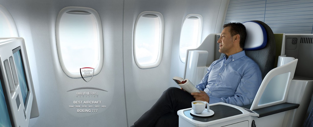 Image of man sitting in 777 first class