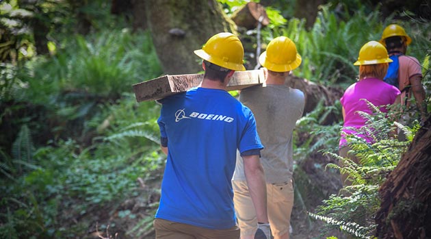 Volunteers working at a Boeing event.