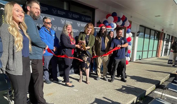   Officials gather at a ribbon-cutting ceremony