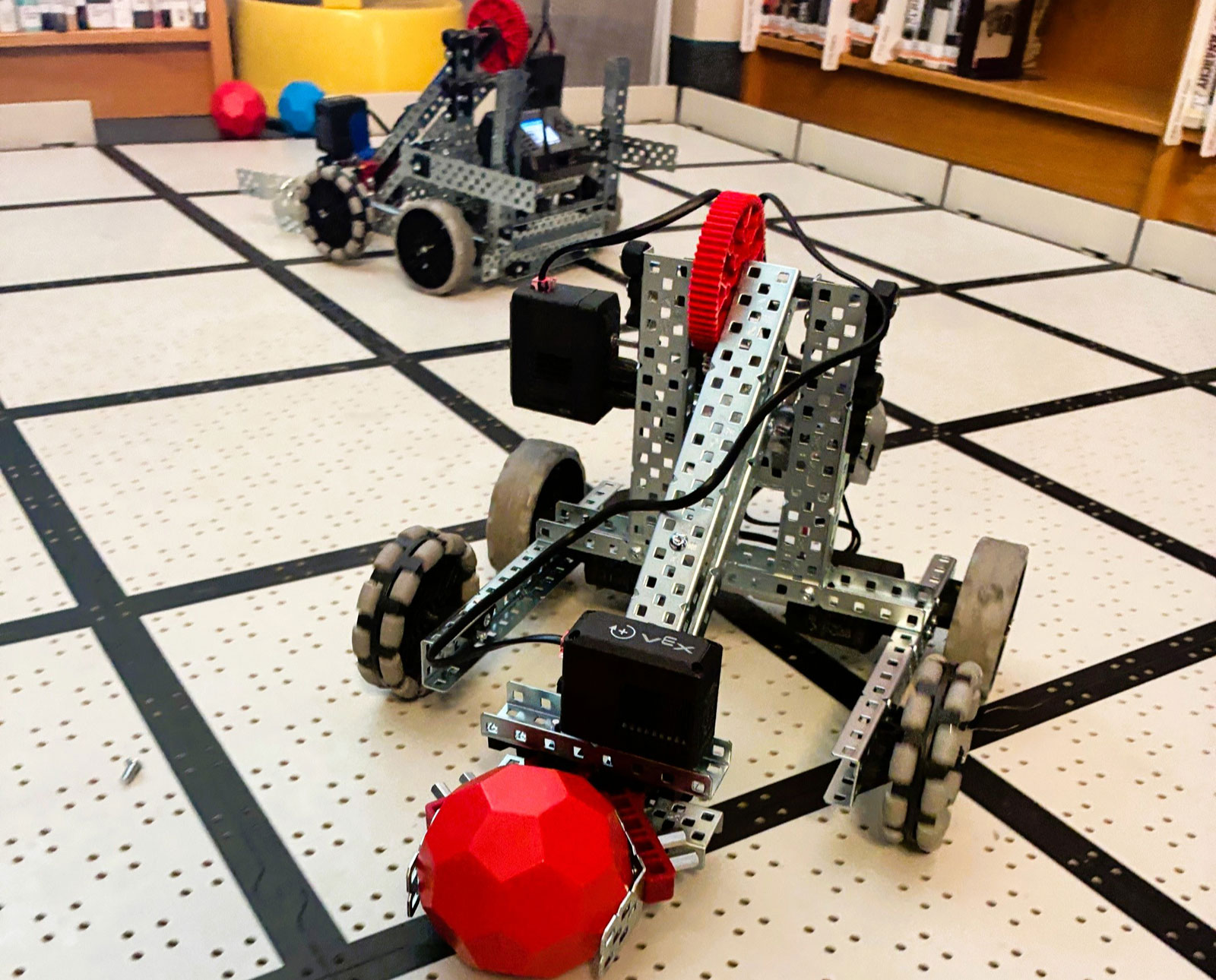 Students demonstrate two robots playing soccer at the Helena Education Foundation event, showcasing the capabilities of the new robotics equipment funded by Boeing’s $100,000 grant. 