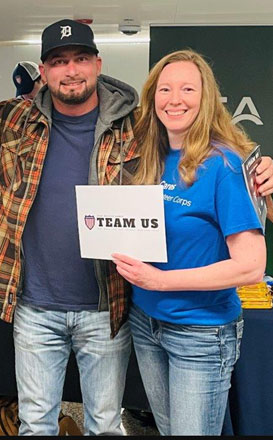 Boeing volunteer Barbara Brower with Team U.S. competitor SSgt. Robert Dominguez.