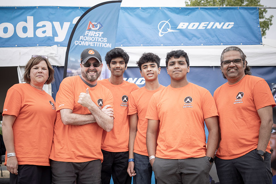 A FIRST Robotics Team from Sammamish, Washington, at the Boeing-sponsored FIRST (For Inspiration and Recognition of Science and Technology) Washington Robotics tent at Seafair.