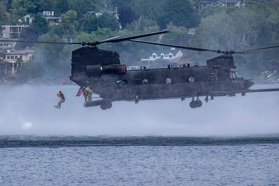 The U.S. Army Chinook helicopter, built by Boeing, demonstrates a water rescue.