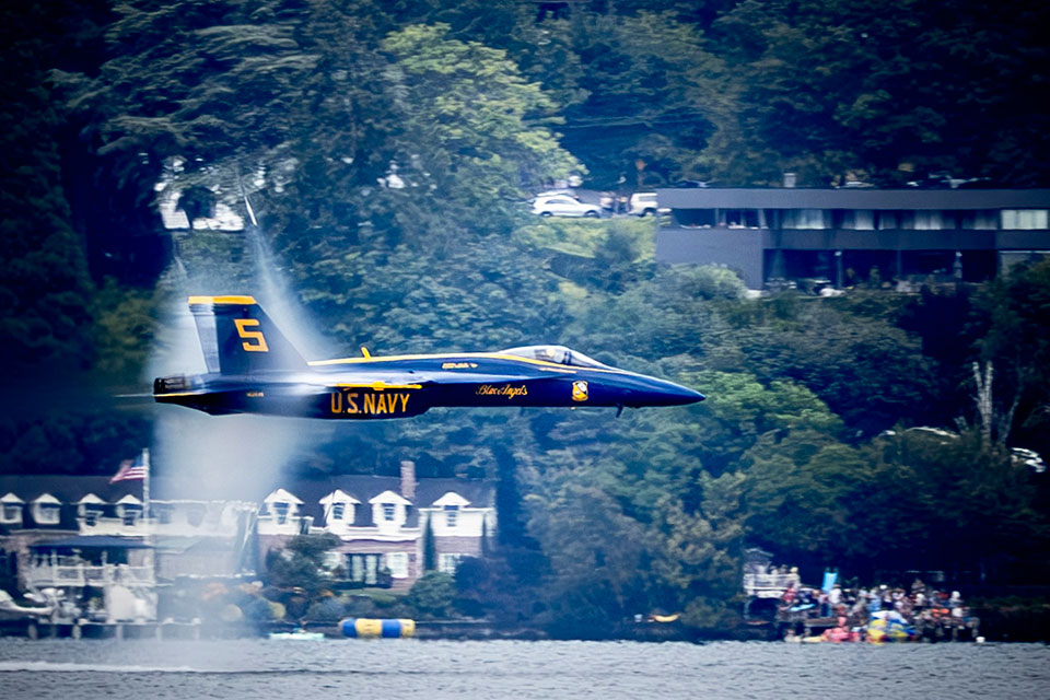 The U.S. Navy Blue Angels demonstrate their precise skills as they fly their F/A-18 Super Hornets over Seattle. The F/A-18 Super Hornets are Boeing made, and Boeing handled all the modifications to turn the Super Hornets from combat fighters in the Navy fleet to demonstration jets.