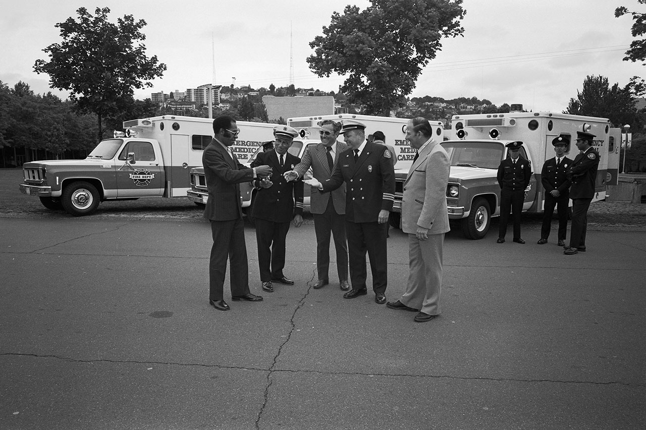 Boeing employees present a new medical vehicle to the King County Fire Chiefs Association in 1973, helping launch Seattle’s Medic One.