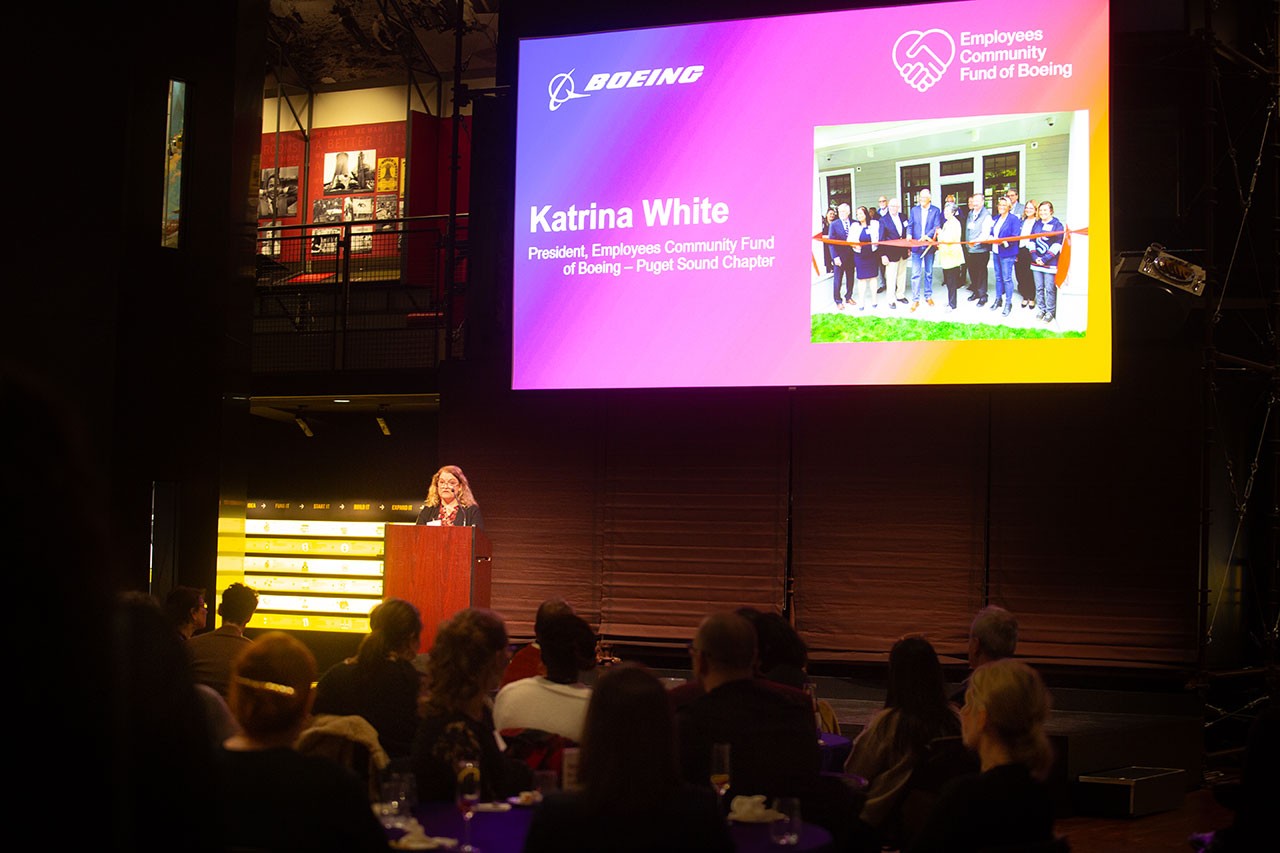 President of the Employees Community Fund of Boeing — Puget Sound Chapter, Katrina White, gives remarks at the 75th anniversary celebration of ECF at the Museum of History and Industry.