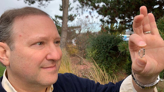 Boeing environment expert Nick Garson displays a Herkimer “diamond”