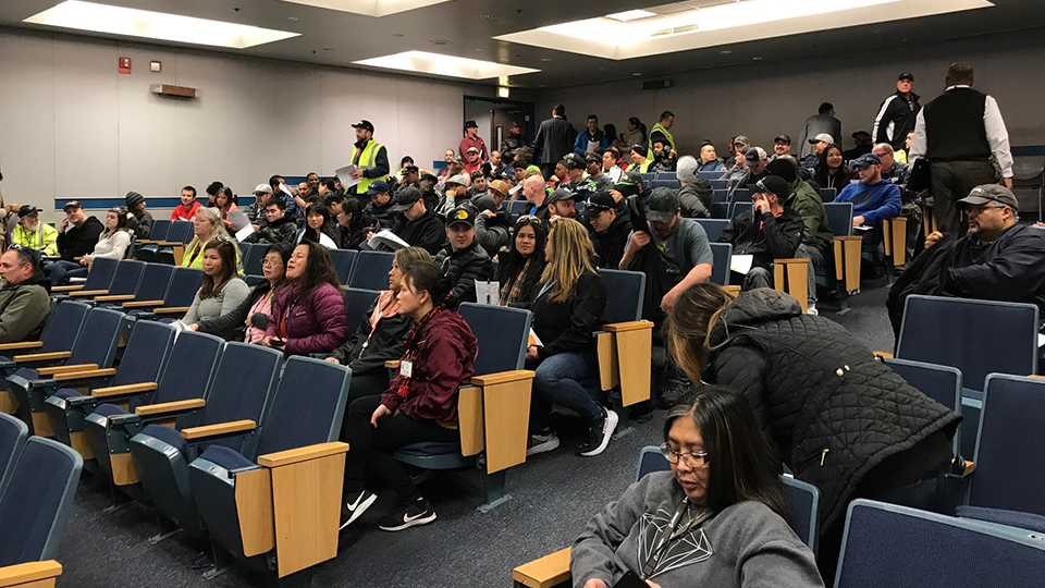 Employees in auditorium.