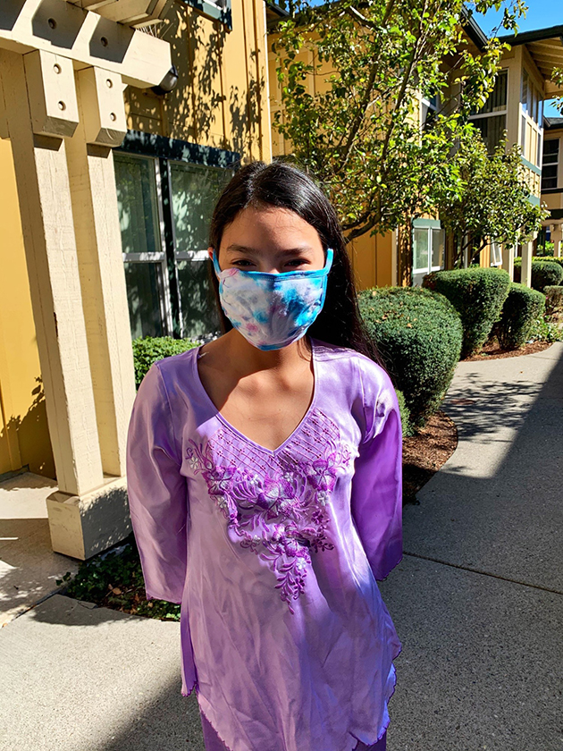 Girl in mask.