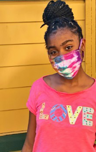 Girl in mask.