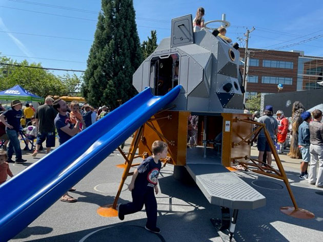   Kids play on Lunar Lander play structure during Kherson Park grand opening, May 20 (Boeing photo)