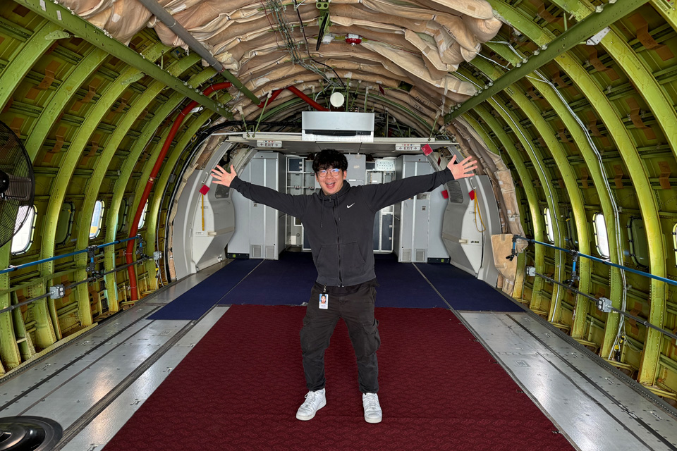 Edmonds college student James Hahn poses in the newly opened training lab. (Boeing photo)
