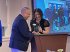 Boeing’s Armando Mejia (L) accepts the 2024 Steven A. Cohen Military Family Clinic Impact Award from clinic director Dr. Nichole Ayres (R)