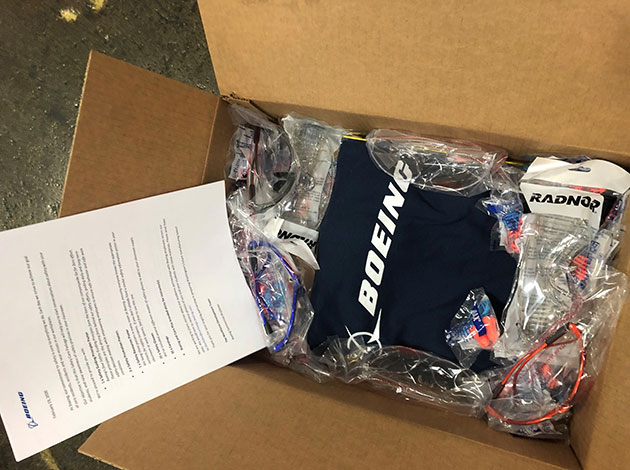 Safety kits are packaged in preparation for sending to partner schools.