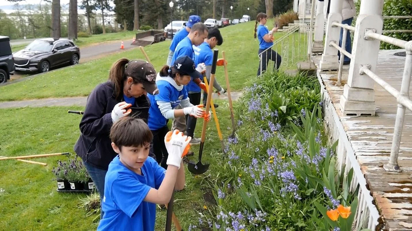 Boeing volunteers plant new greenery and tidy grounds at YMCA Camp Casey during a volunteer day on April 18. 