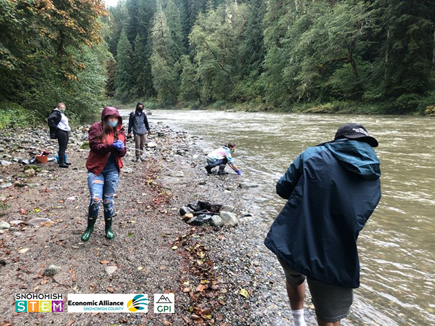 Students on the Sauk River collect samples