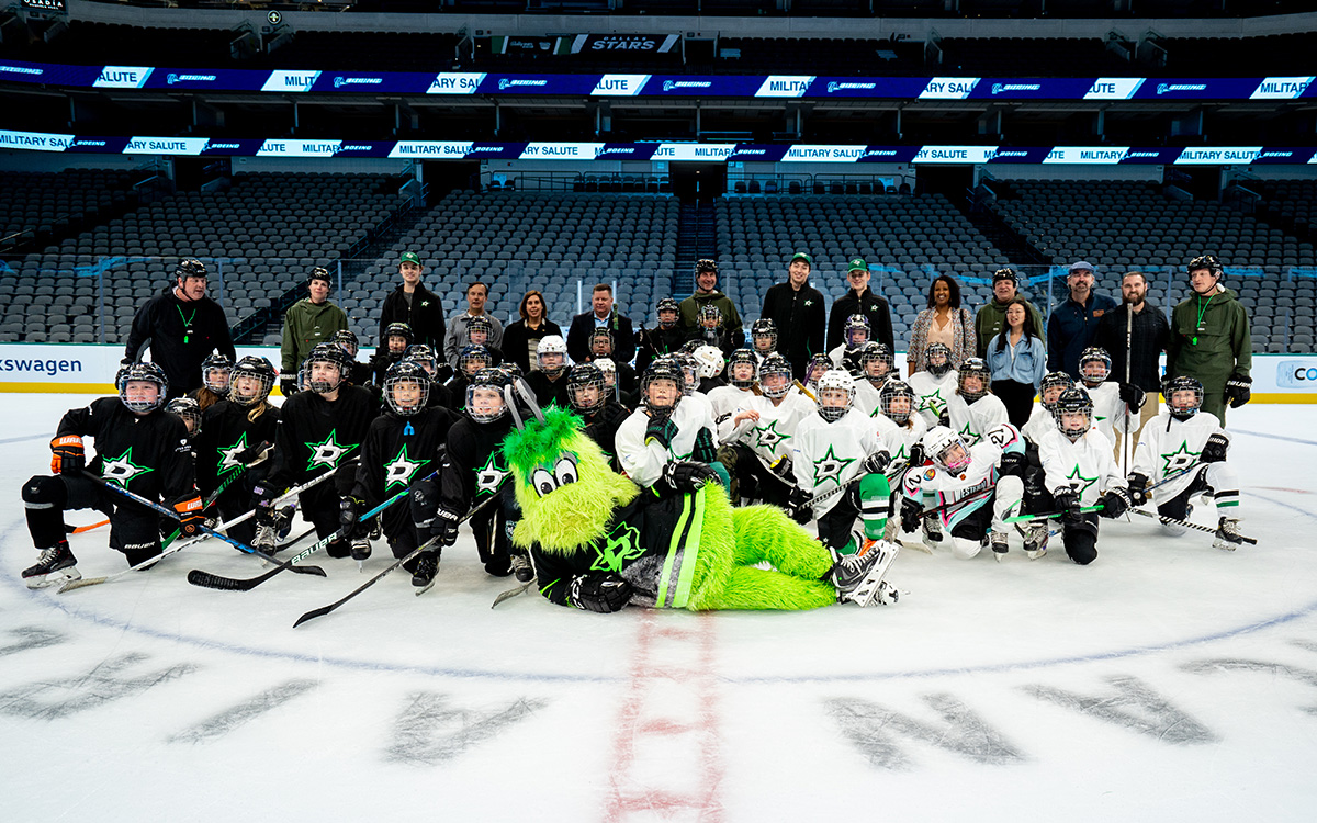 Children of military families participate in a hockey clinic hosted by the Dallas Stars and Boeing