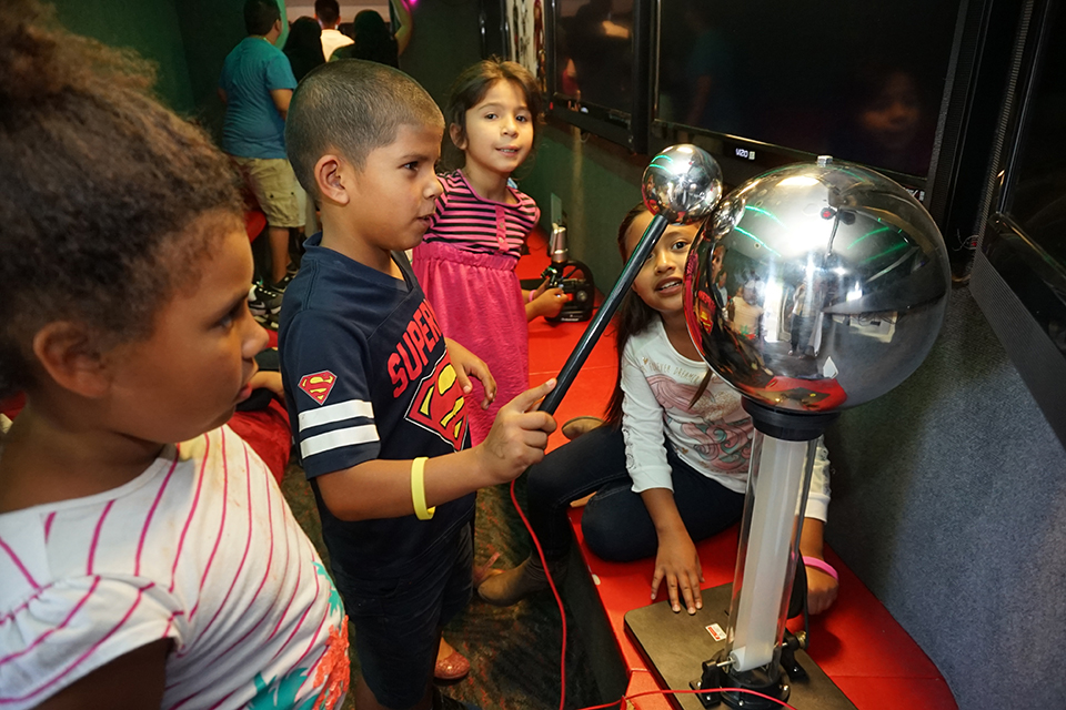 Children with science experiment