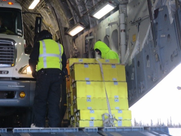 Disassembled loading ramp in aircraft cargo hold