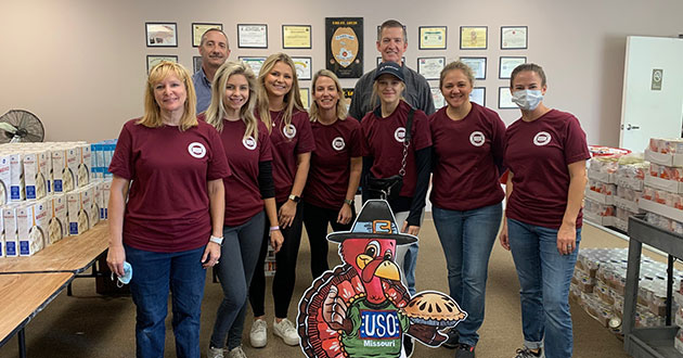 Boeing employees at USO Thanksgiving meal packing event