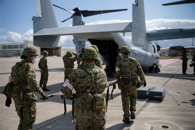   Japan Ground Self Defense Force perform simulated medical evacuation utilizing an MV-22B Osprey during Keen Sword 21 exercise at Marine Corps Air Station Futenma in Okinawa, Japan