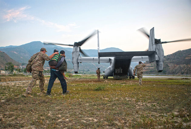 U.S. Air Force Joint Task Force 505 helps evacuate earthquake victims from an area near Charikot, Nepal