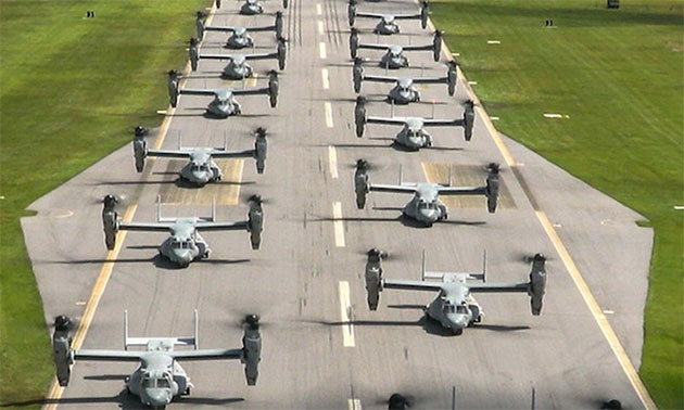   MV-22B Ospreys at Marine Corps Air Station New River, North Carolina prepare to fly