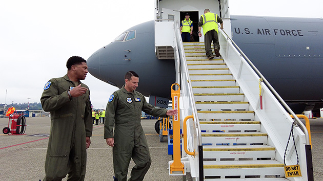Lt. Col. Ted Fisher (right) boards the first KC-46A delivered to Travis Air Force Base moments before its flight from Seattle to Northern California.