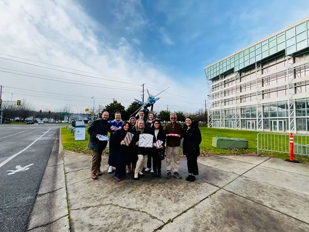 Katelynn and her colleagues adopted a military family for the holidays through Boeing community partner Greentrike.