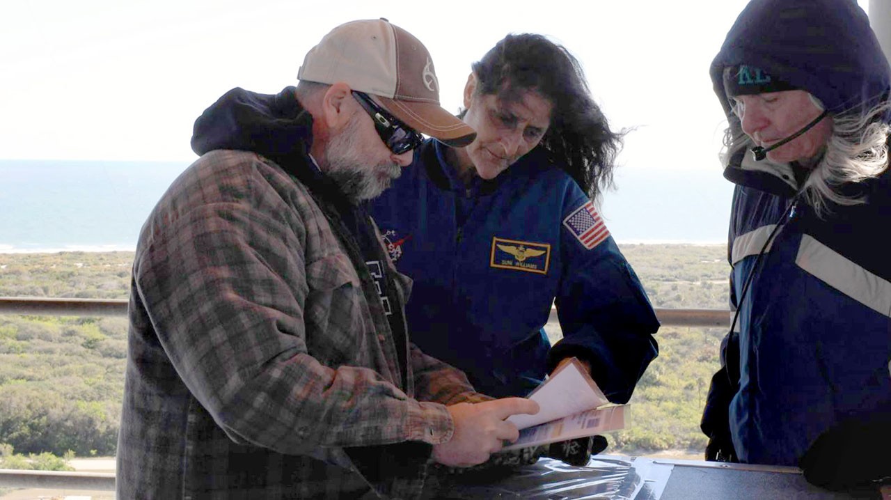 Michael Decarlo, right, and Cason Chernault, who are on the Pad team with NASA astronaut Suni Williams.