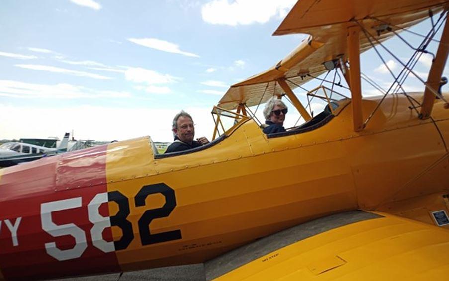 Dorothy Stuart flying a Boeing Stearman, as part of her final training flight.