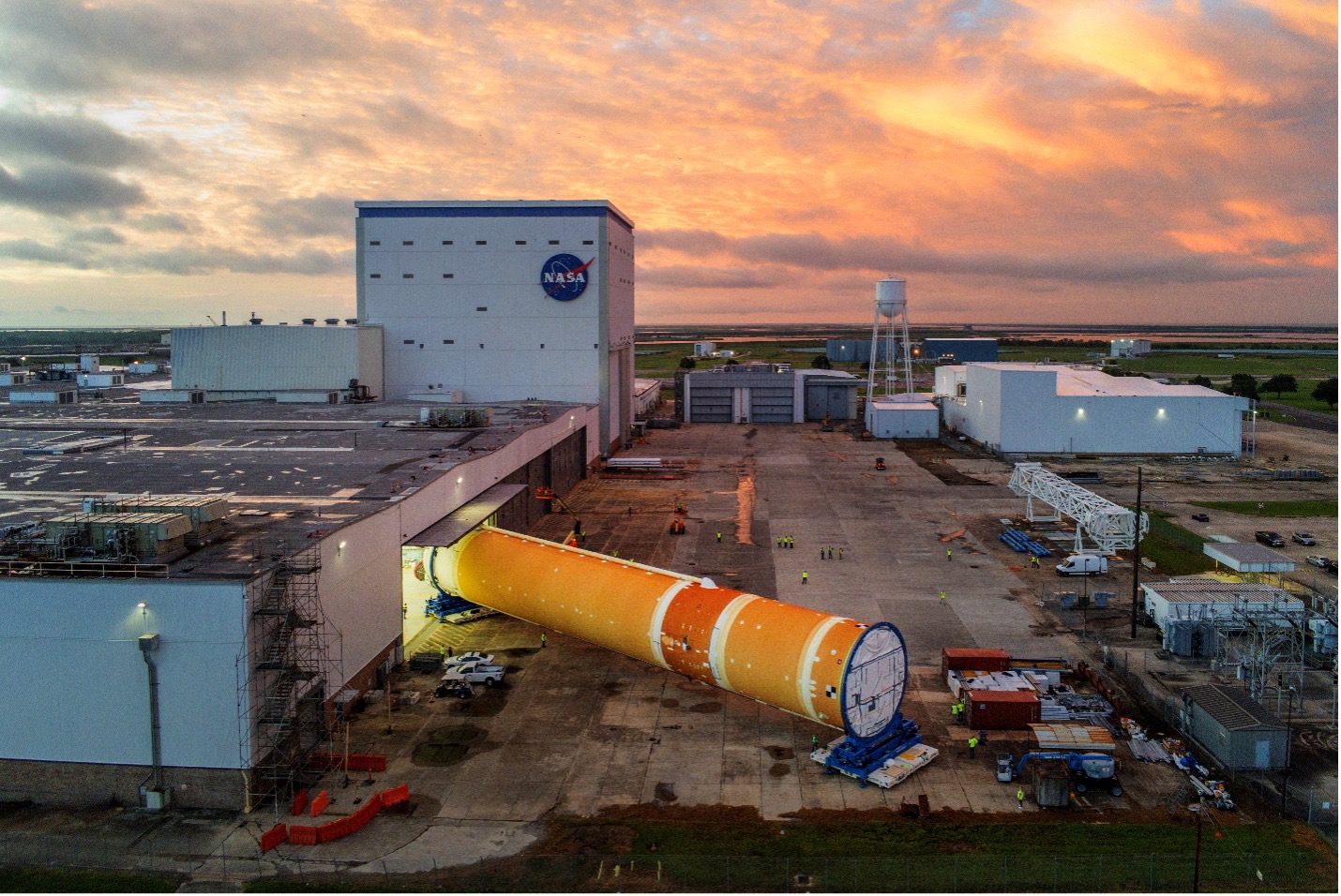 Core Stage 2 being moved inside of building at NASA’s Michoud Assembly Facility in New Orleans ahead of rollout.