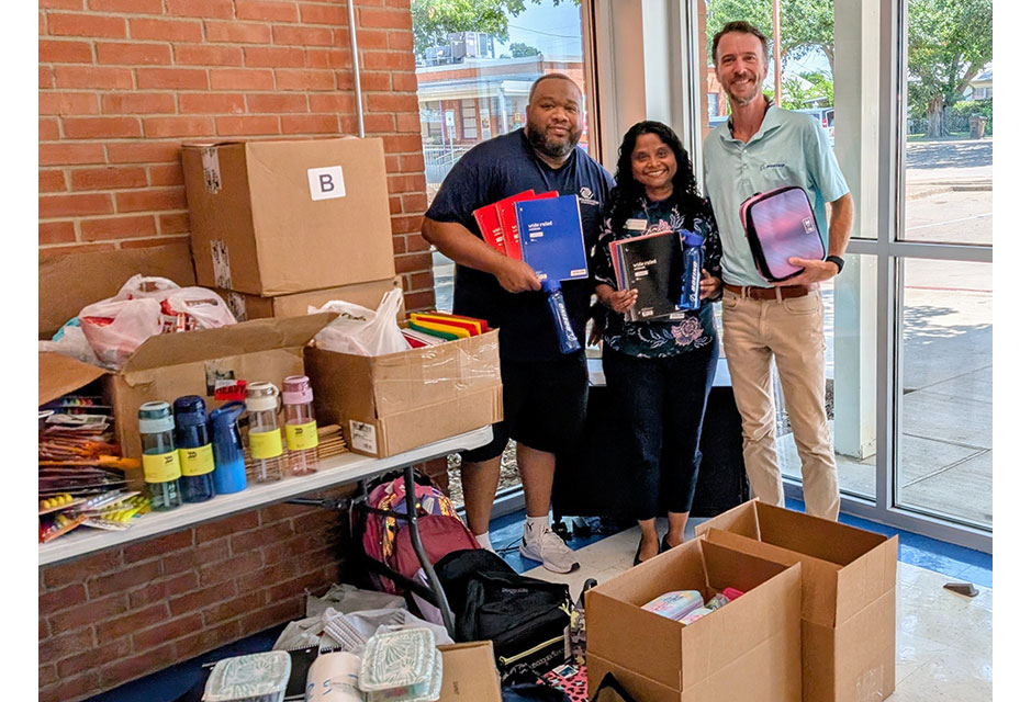 In Plano, Texas, Boeing employee volunteers stuff backpacks full of school supplies to benefit the Boys and Girls Clubs of Collin County.
