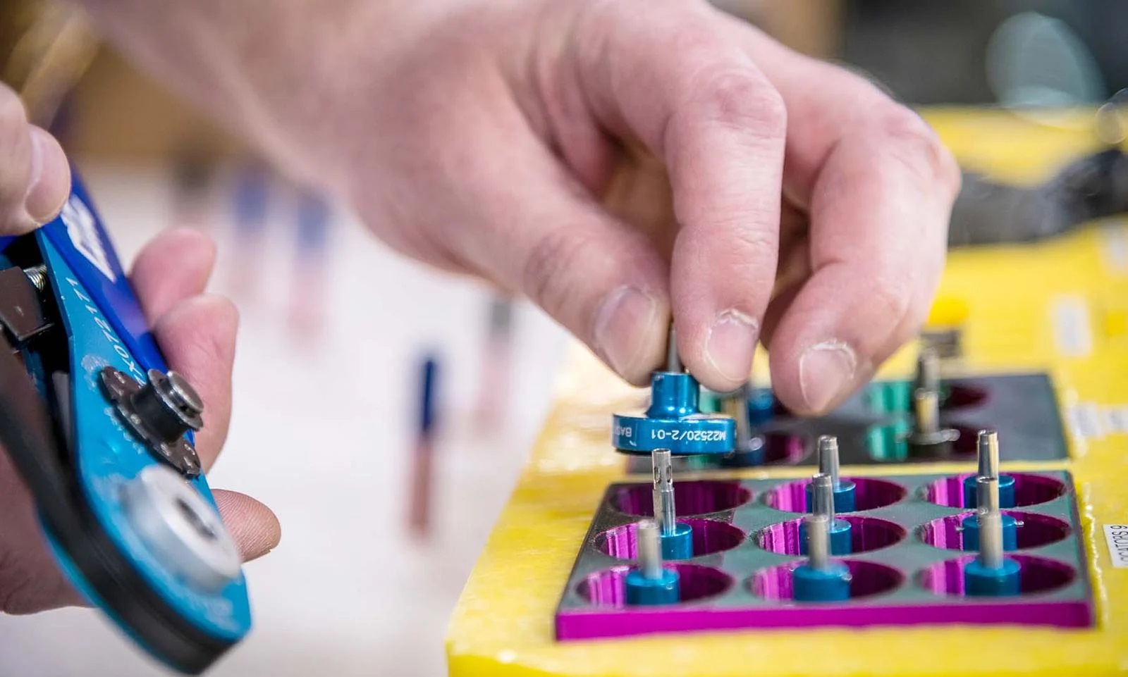 A locator tool is placed into a 3D-printed tray.