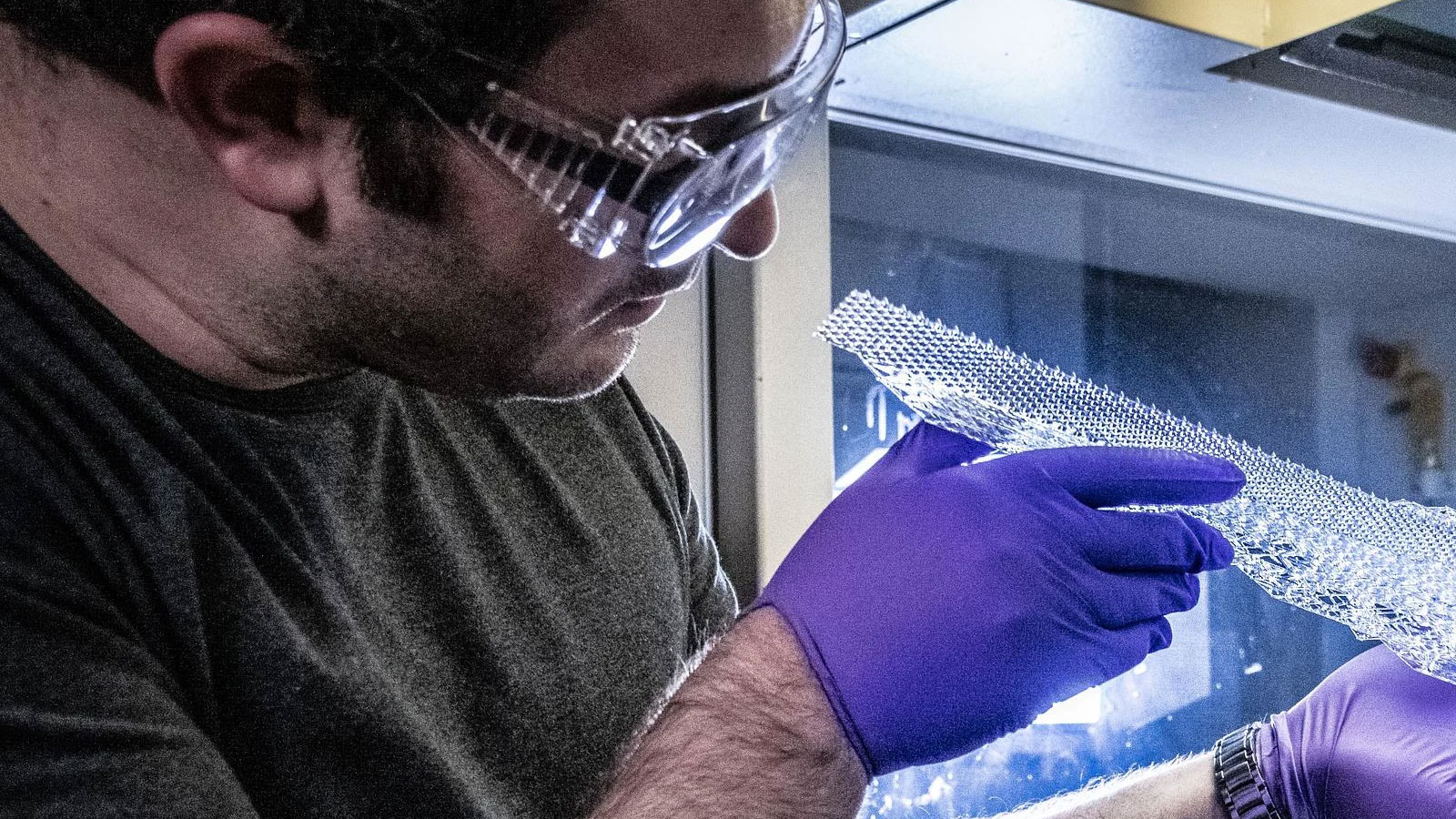 Engineer Gunner Santana inspects an ice shape in the Additive Manufacturing & Prototyping Lab